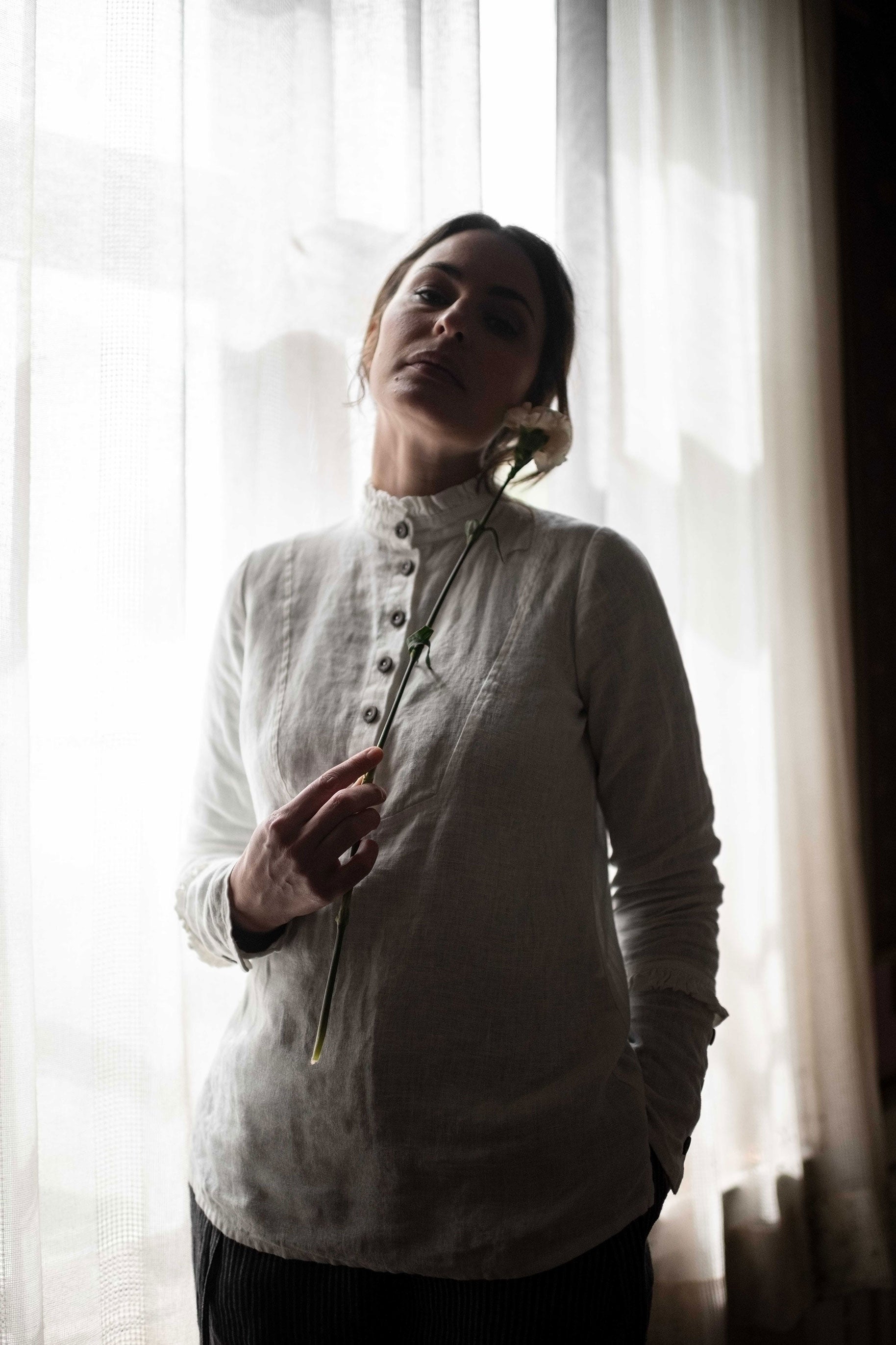 Linen blouse with ruffle details