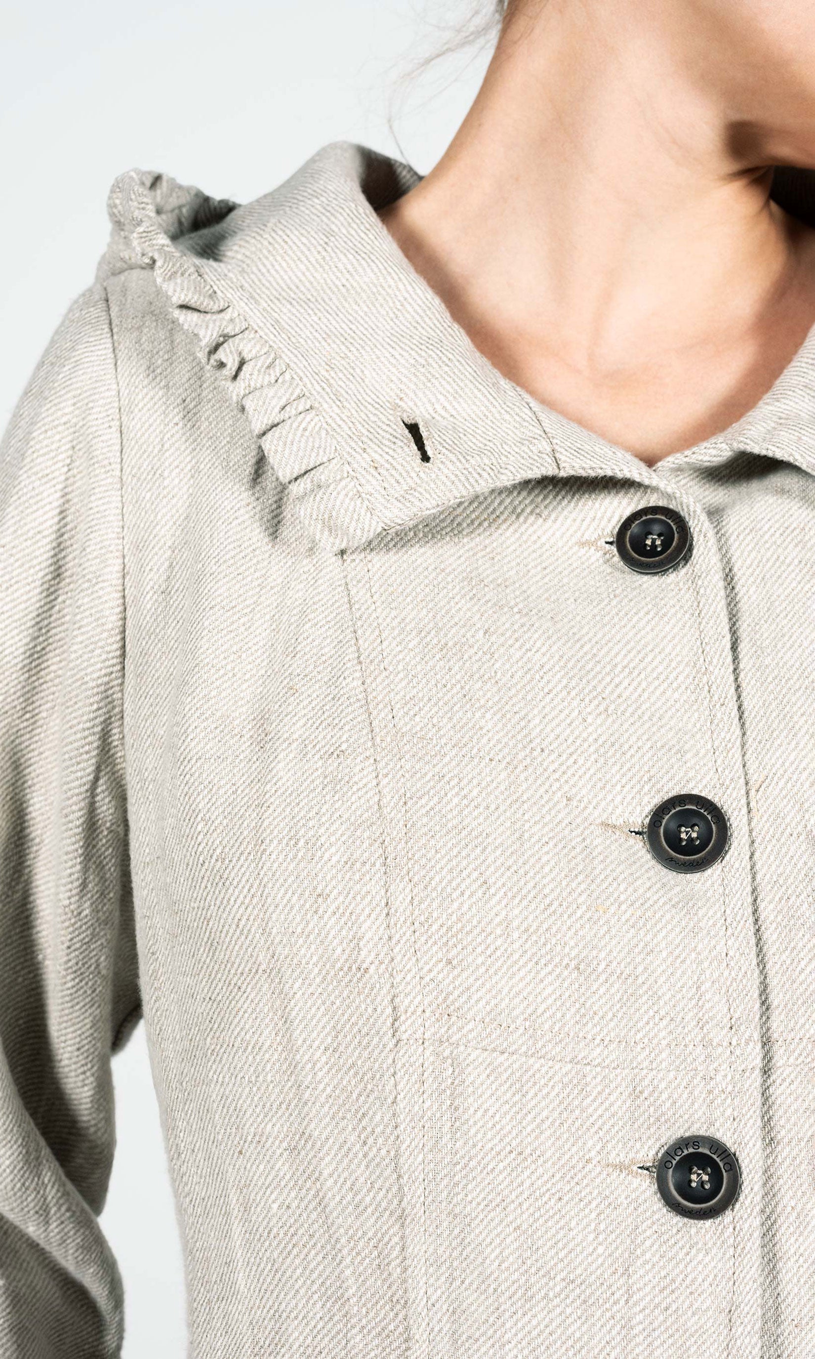 Lined linen jacket with ruffles and hood