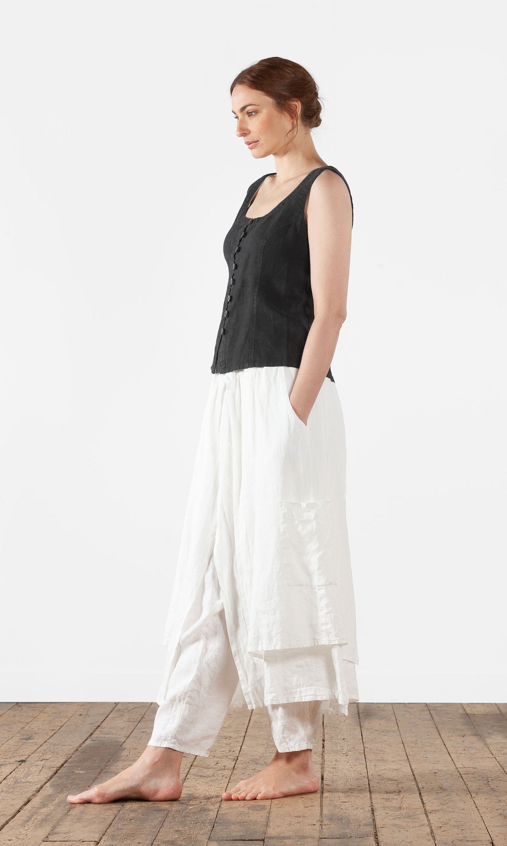 Linne med snörning i ryggen