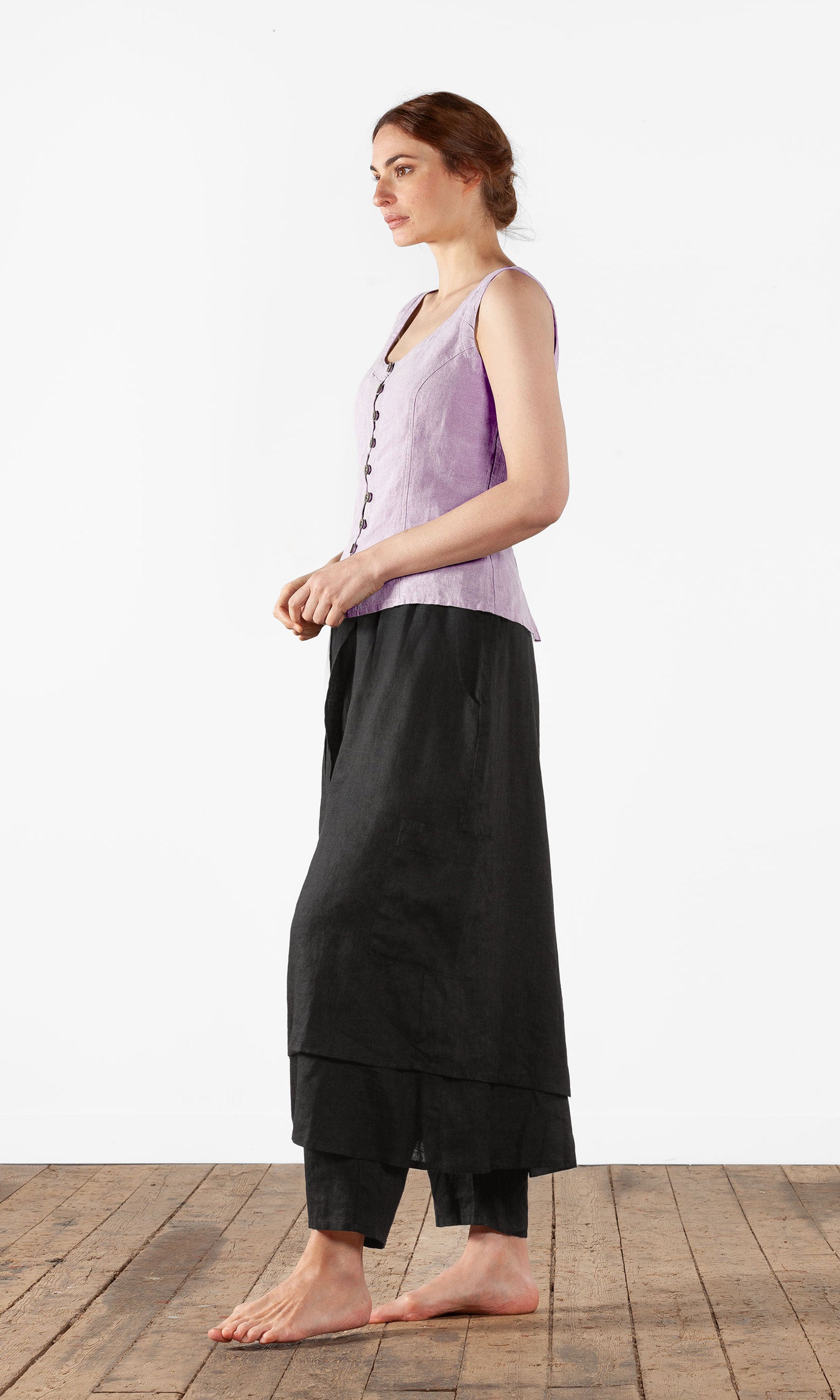 Linne med snörning i ryggen