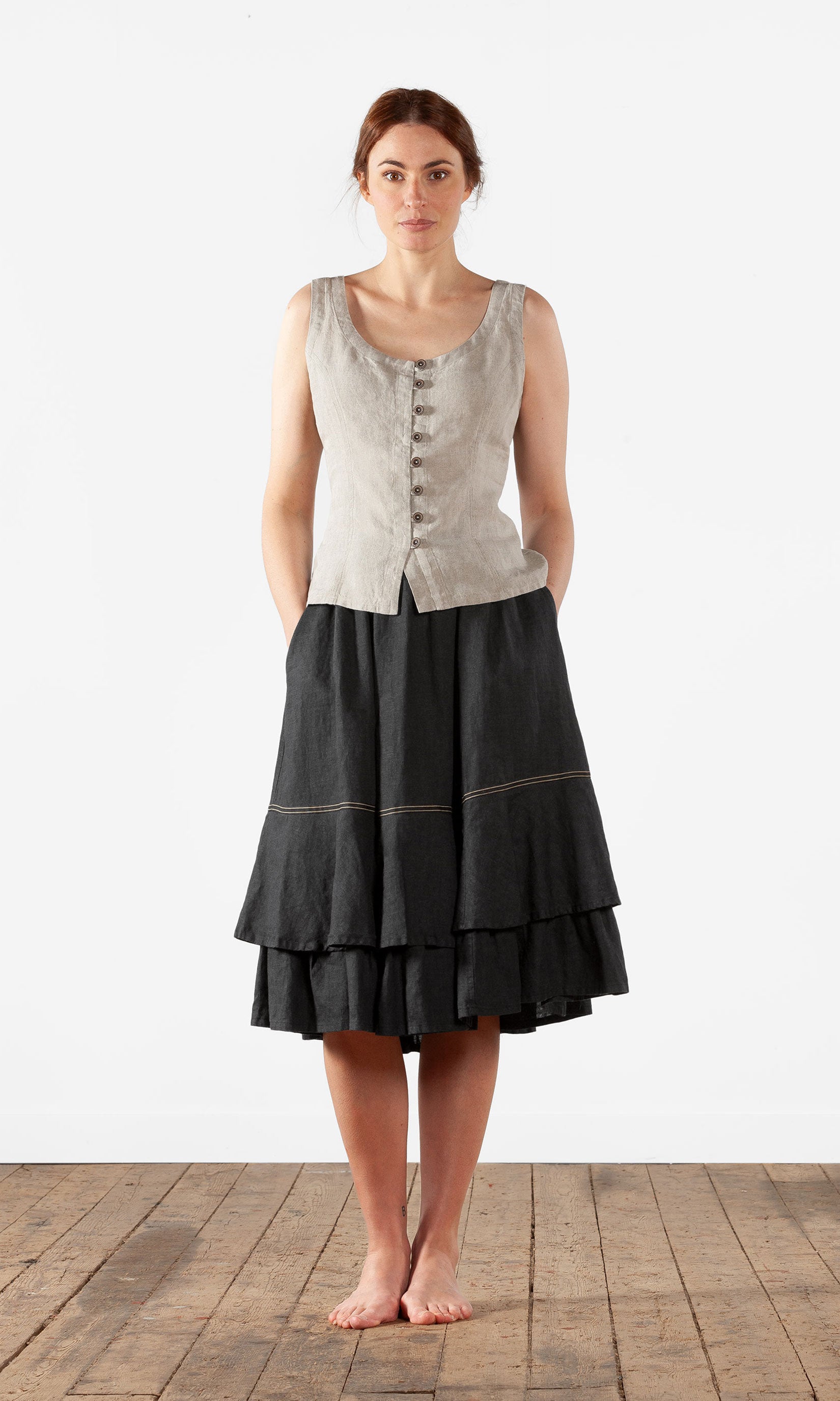 Linne med snörning i ryggen