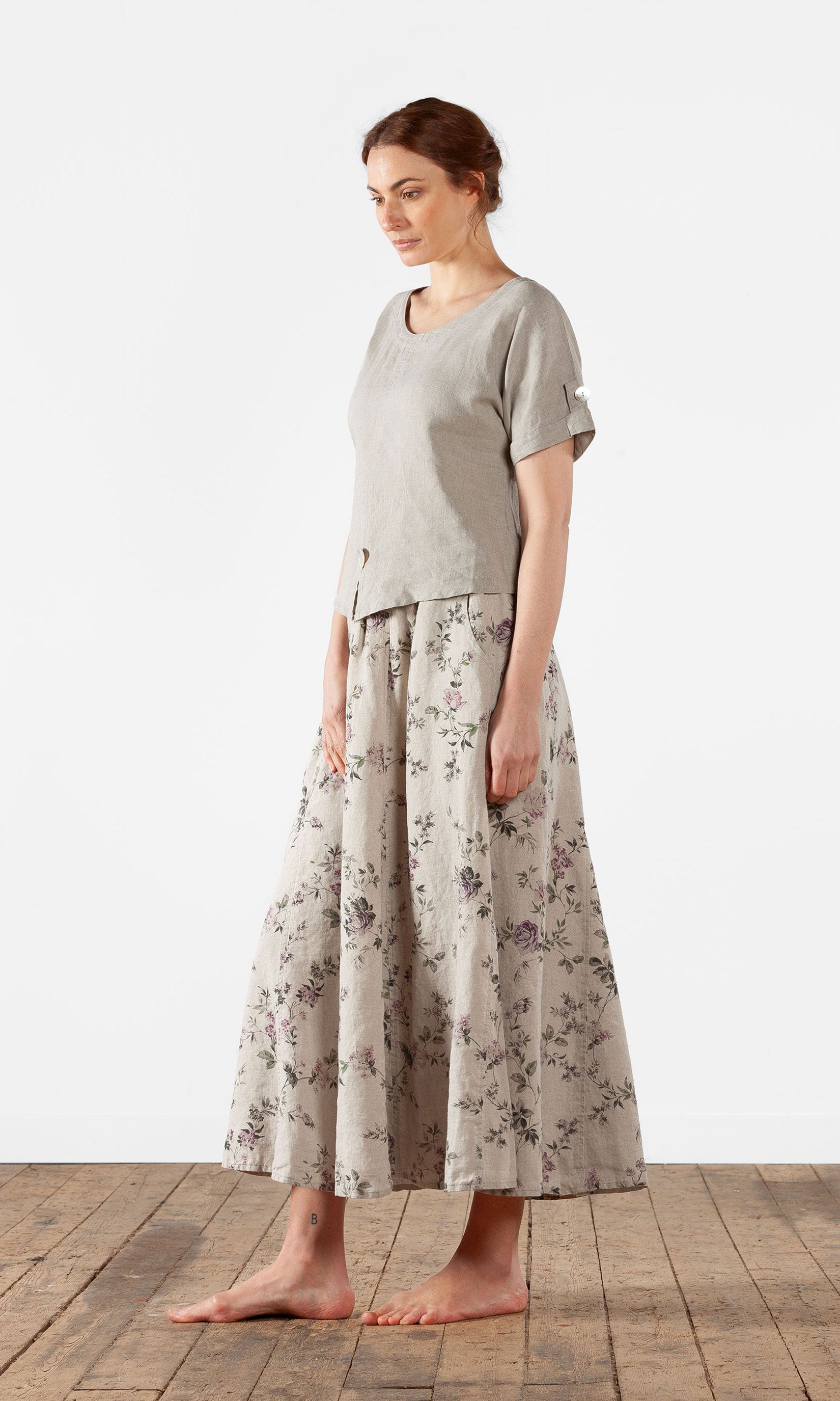 Kort linnetopp med pärlemorknappar