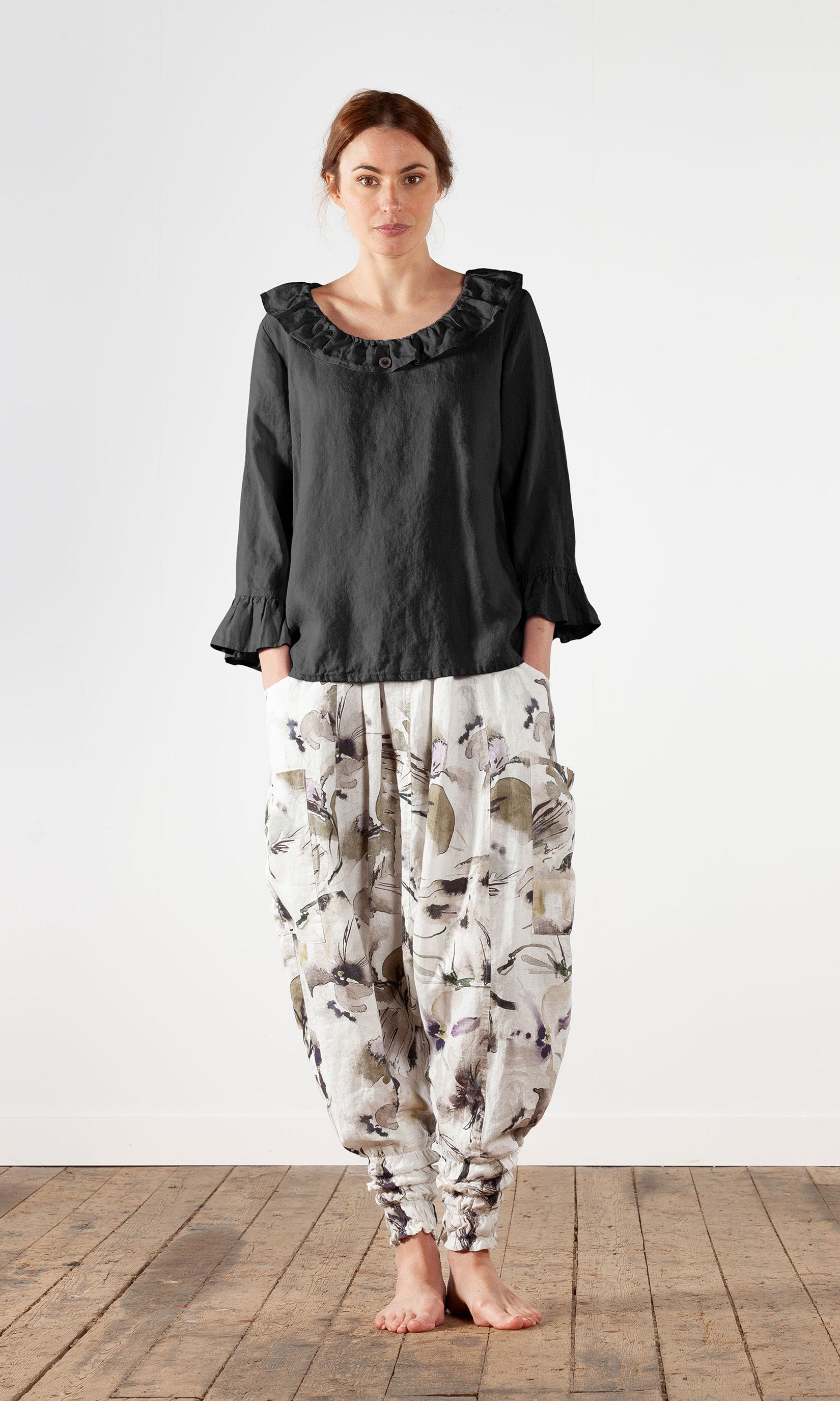 Straight blouse with ruffles in linen