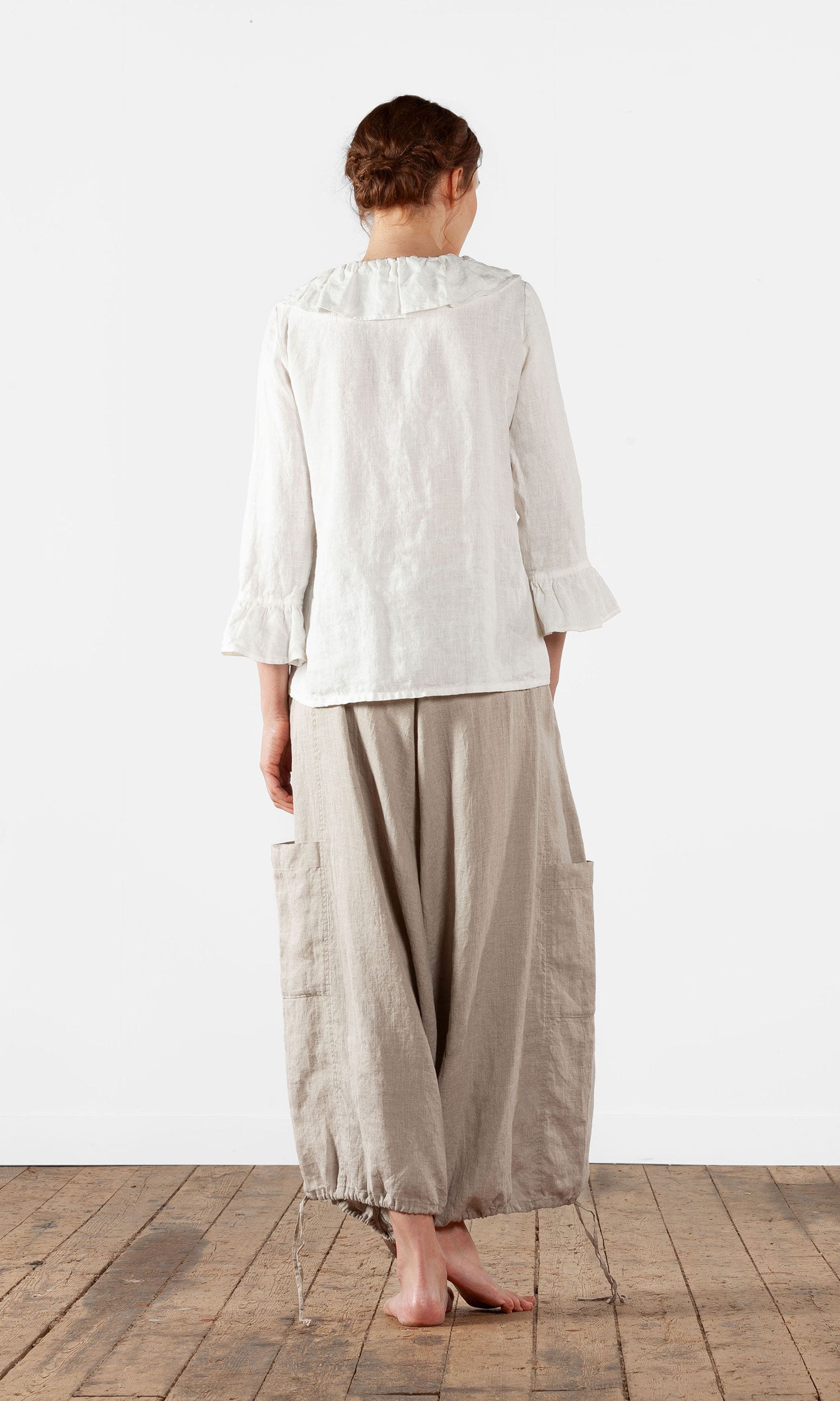 Straight blouse with ruffles in linen