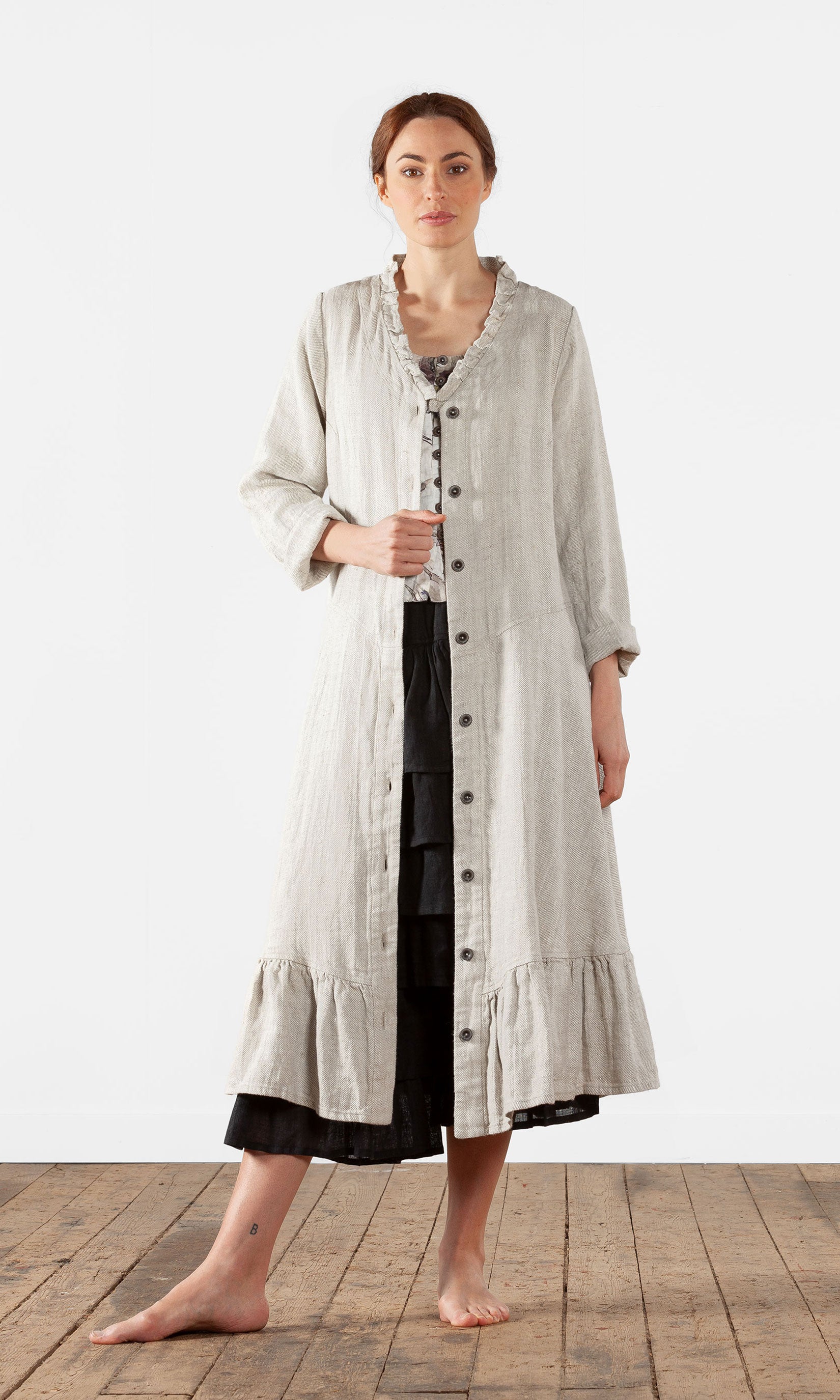 Linnerock med volang, v-ringad