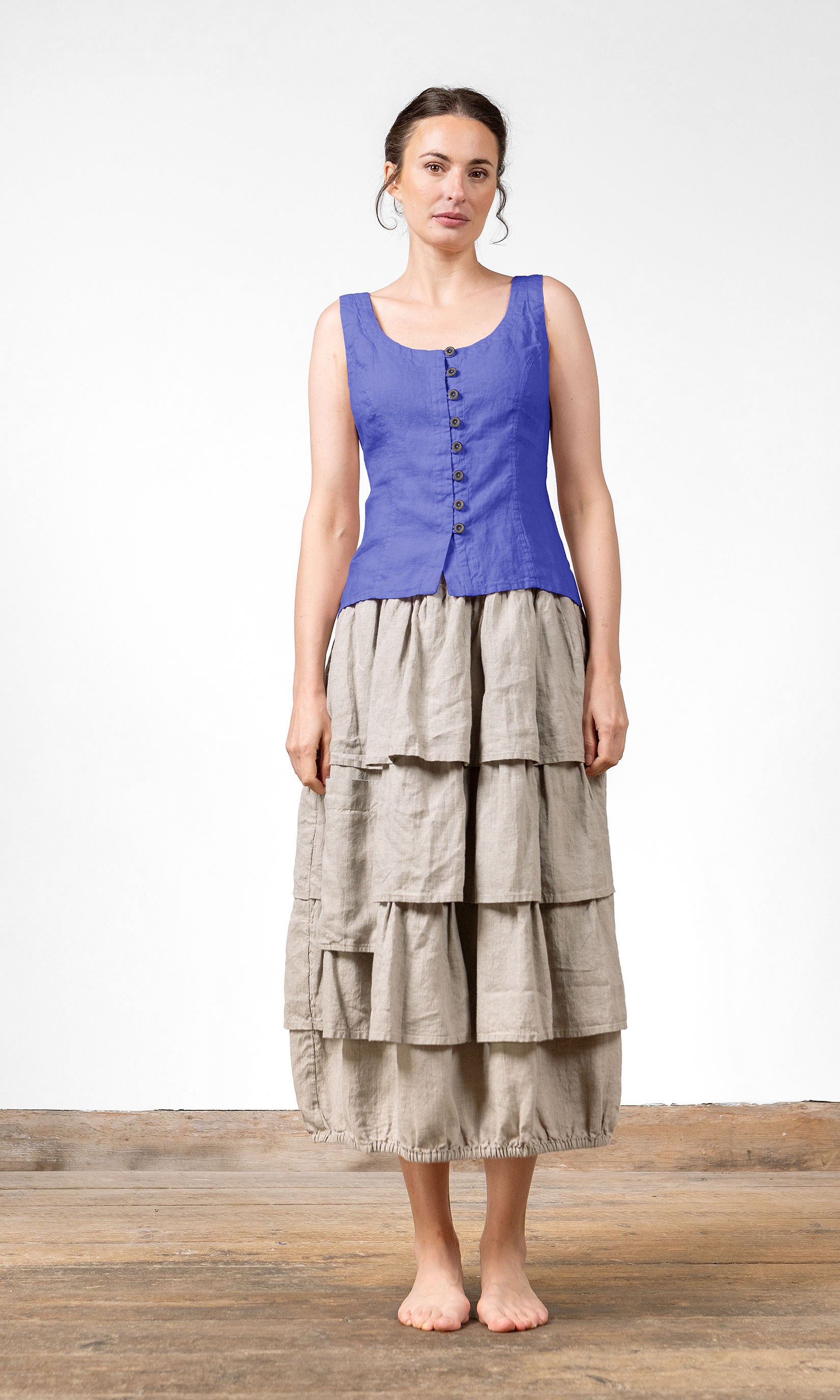 Linne med snörning i ryggen