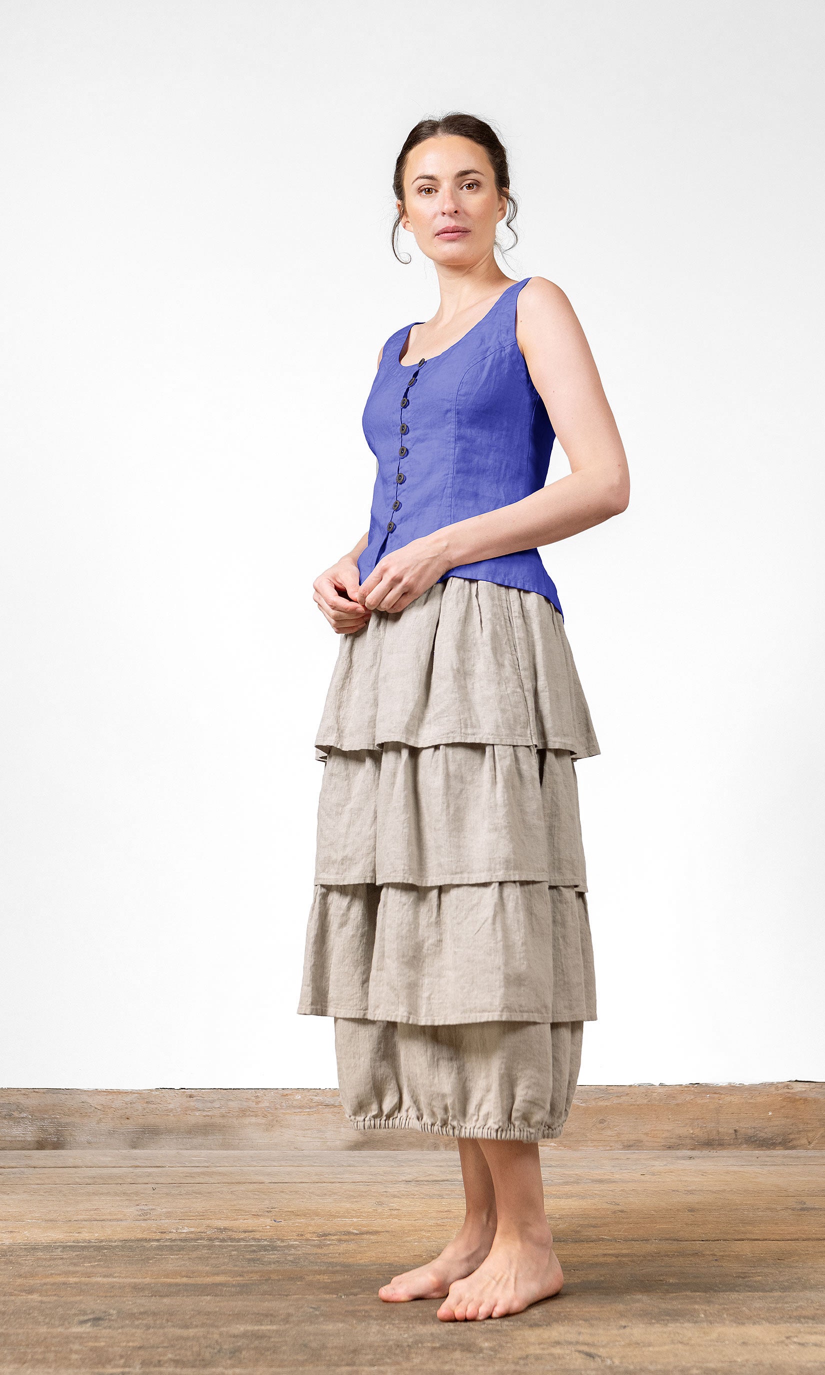 Linne med snörning i ryggen