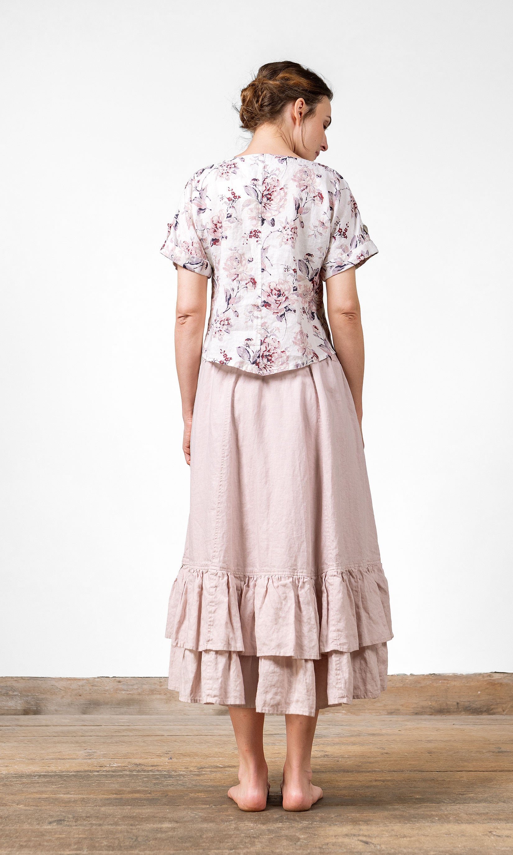 Kort linnetopp med pärlemorknappar