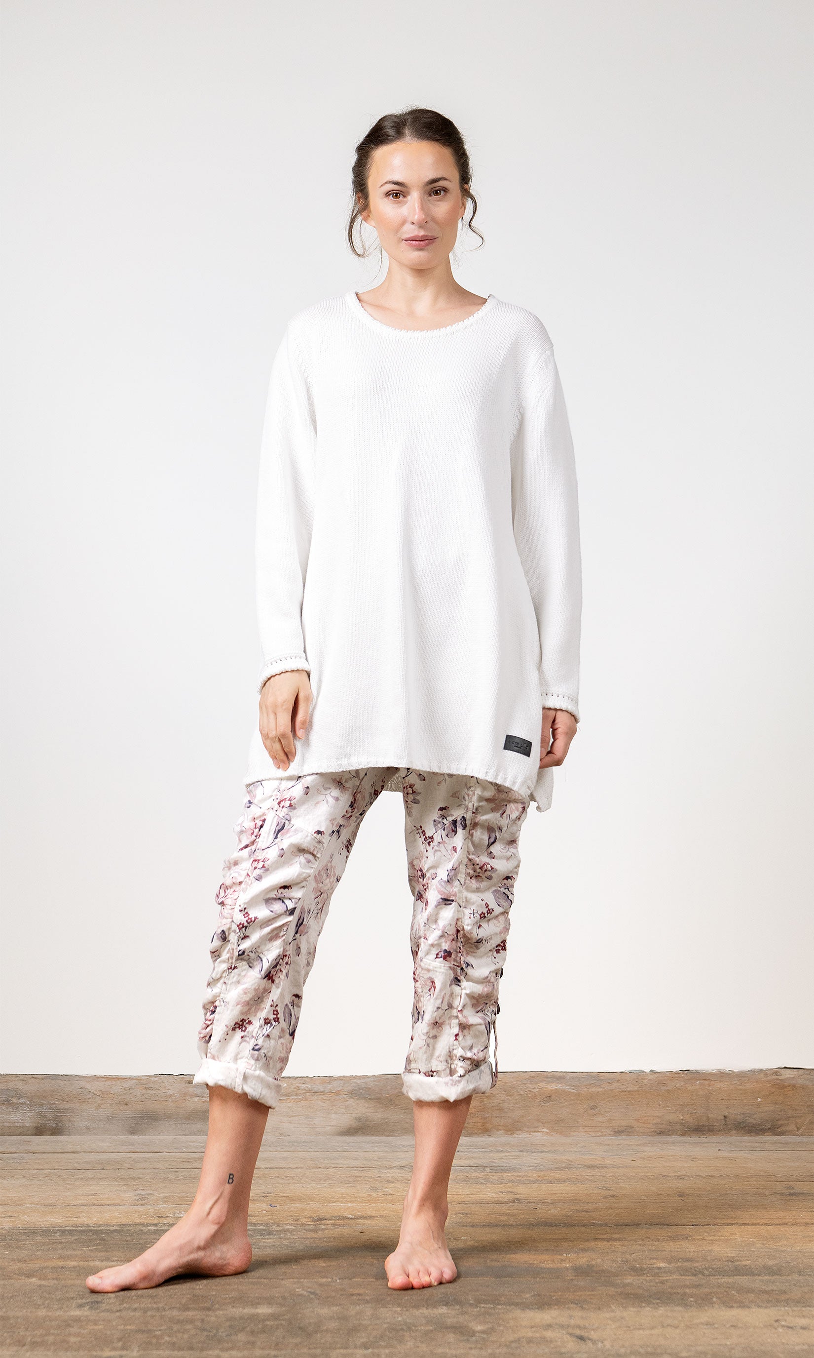 Long knitted A-line sweater in organic cotton