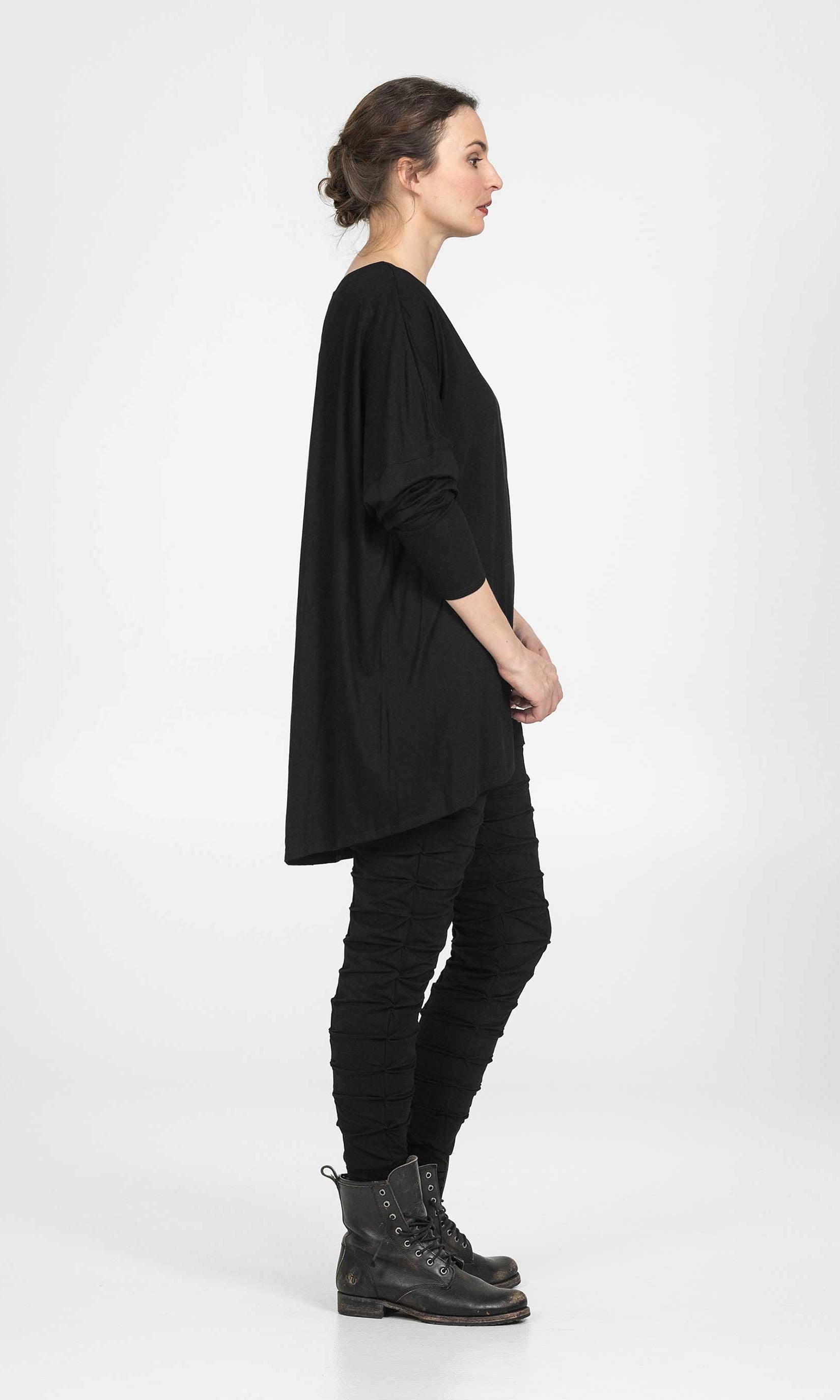 Oversize top with buttoning at the back