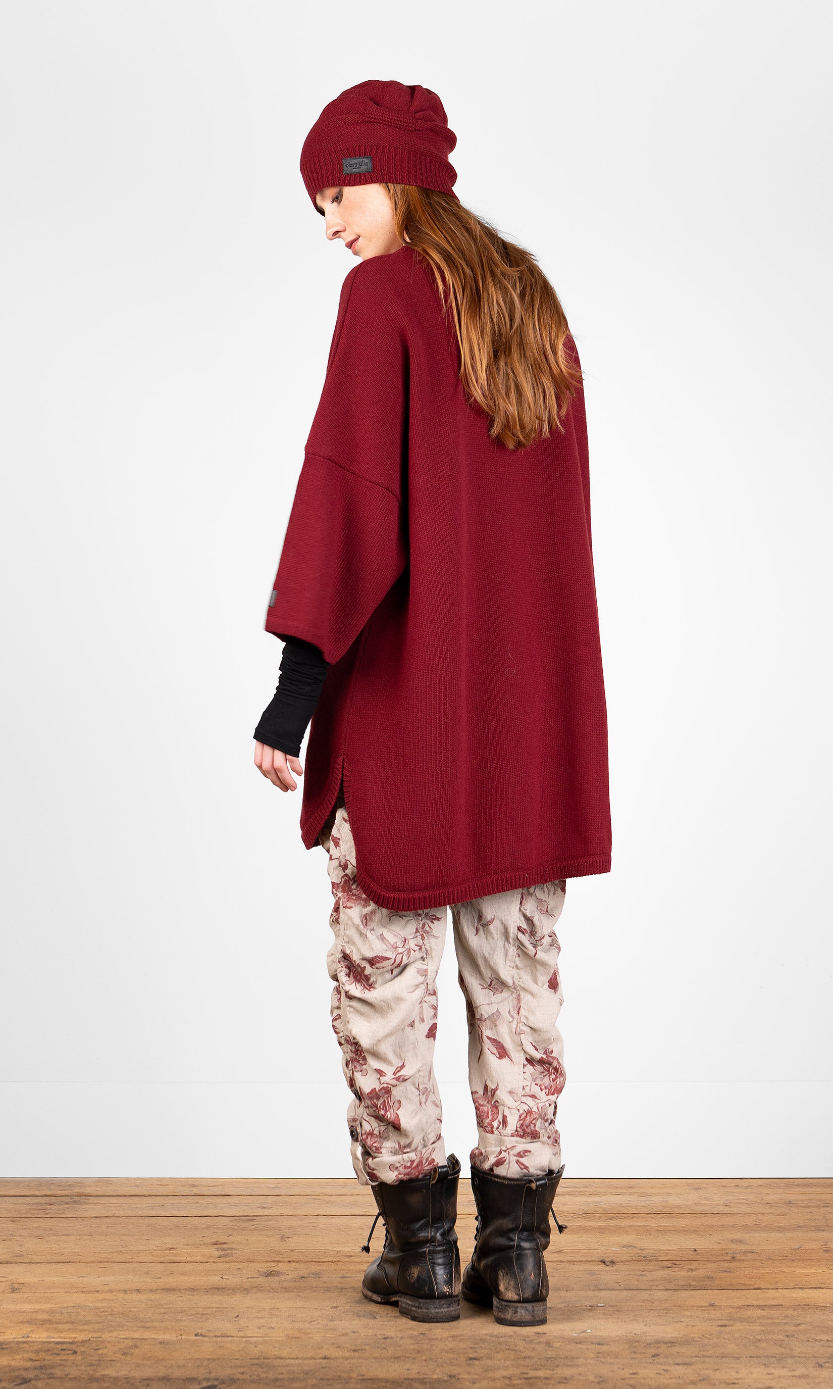 Lang strikket ullgenser i oversize-modell