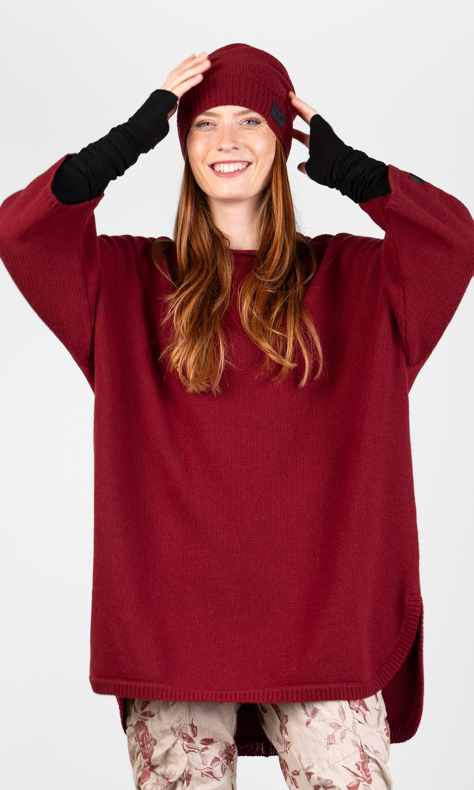 Lang strikket ullgenser i oversize-modell