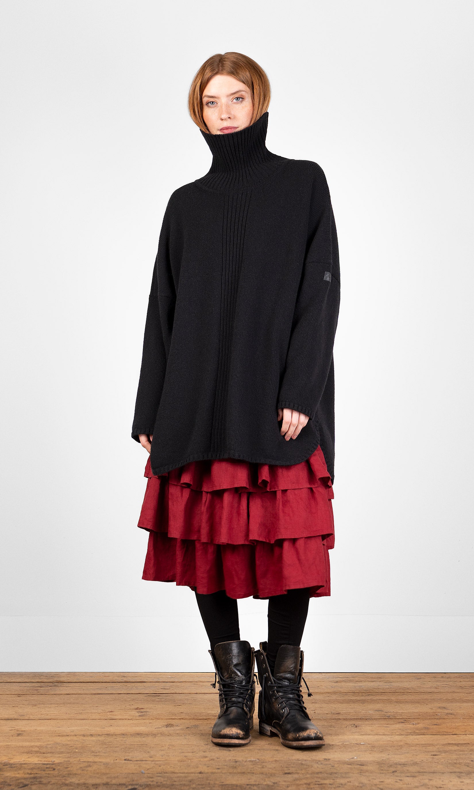 Oversized ullgenser med høy hals