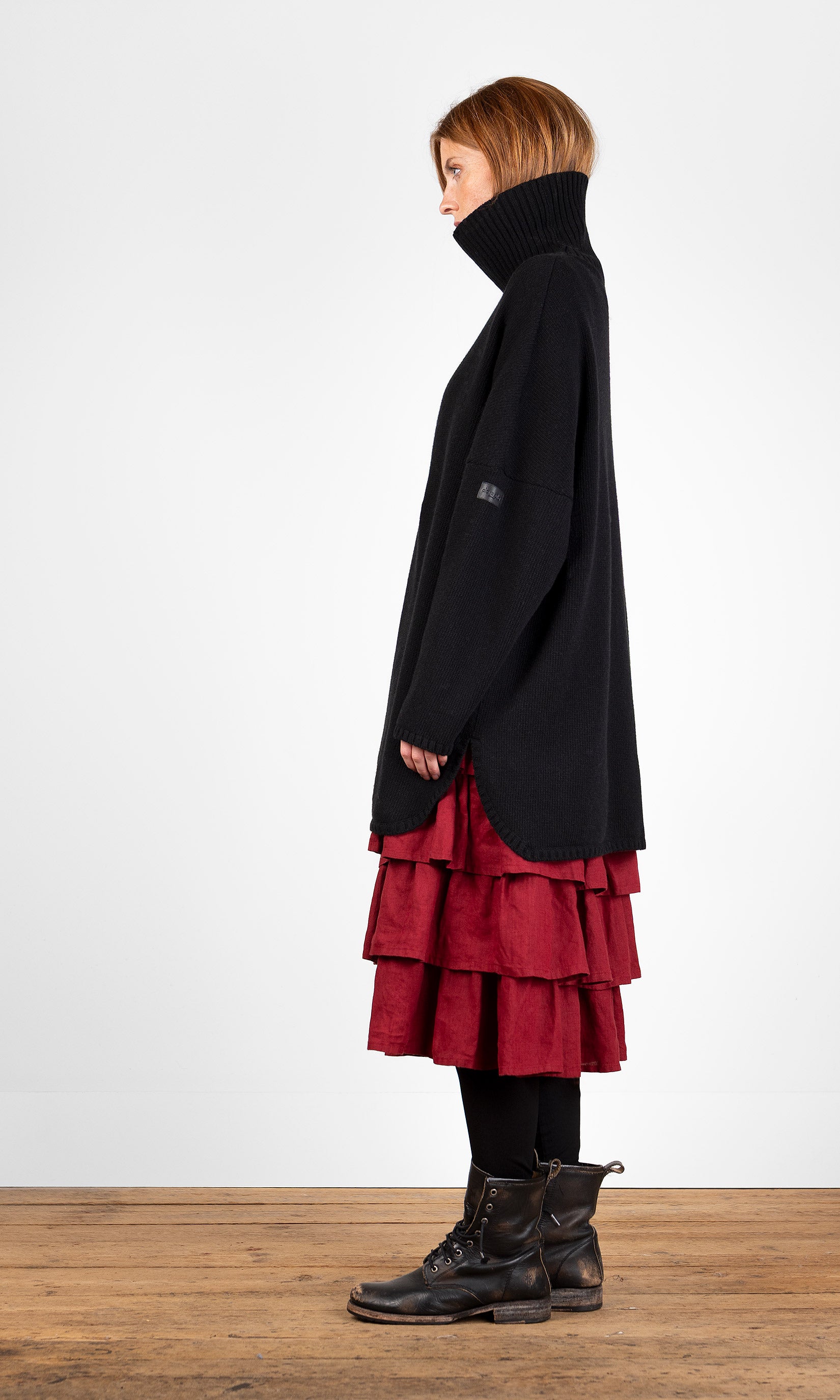 Oversized ullgenser med høy hals