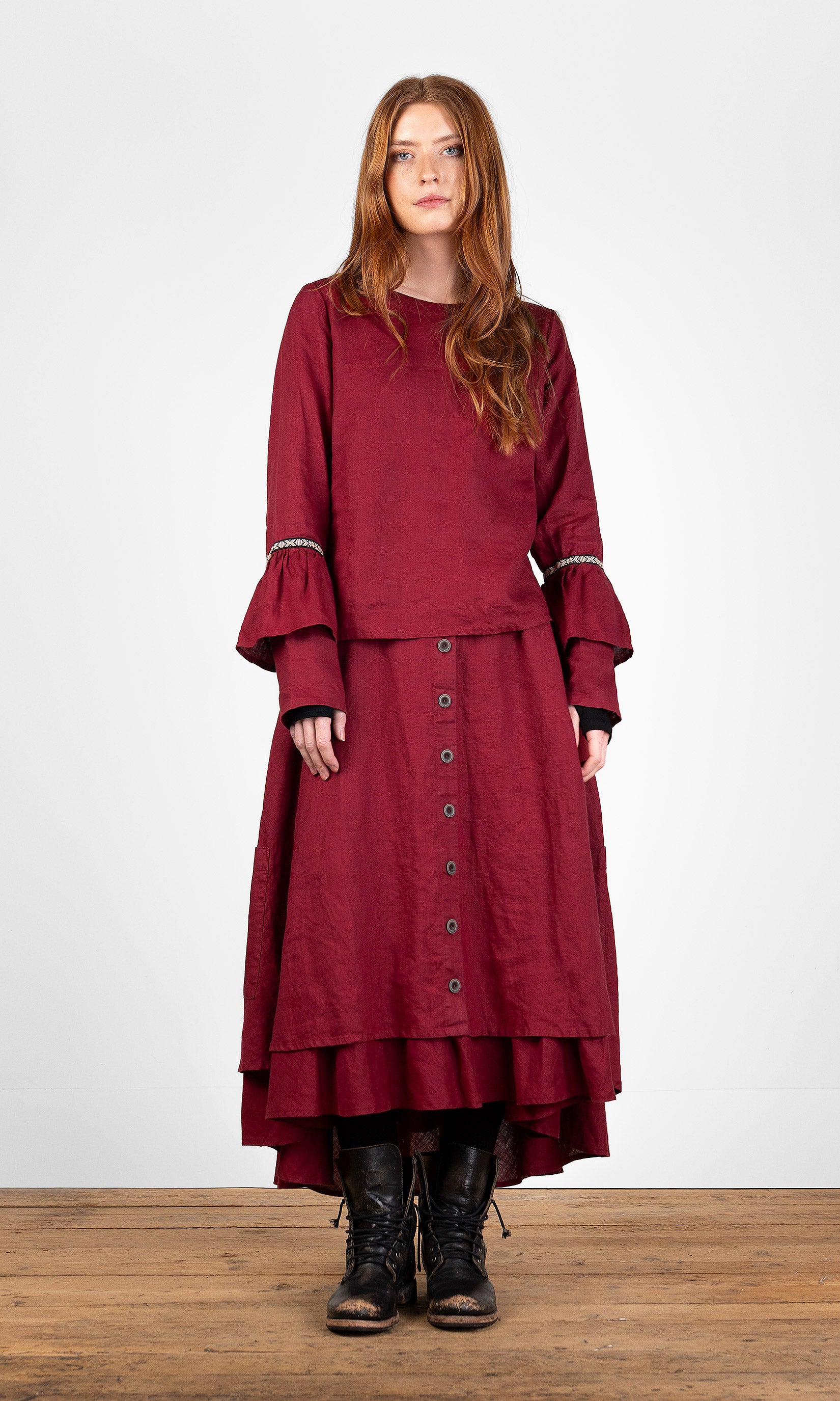 Linen blouse with ruffled sleeves and decorative ribbon