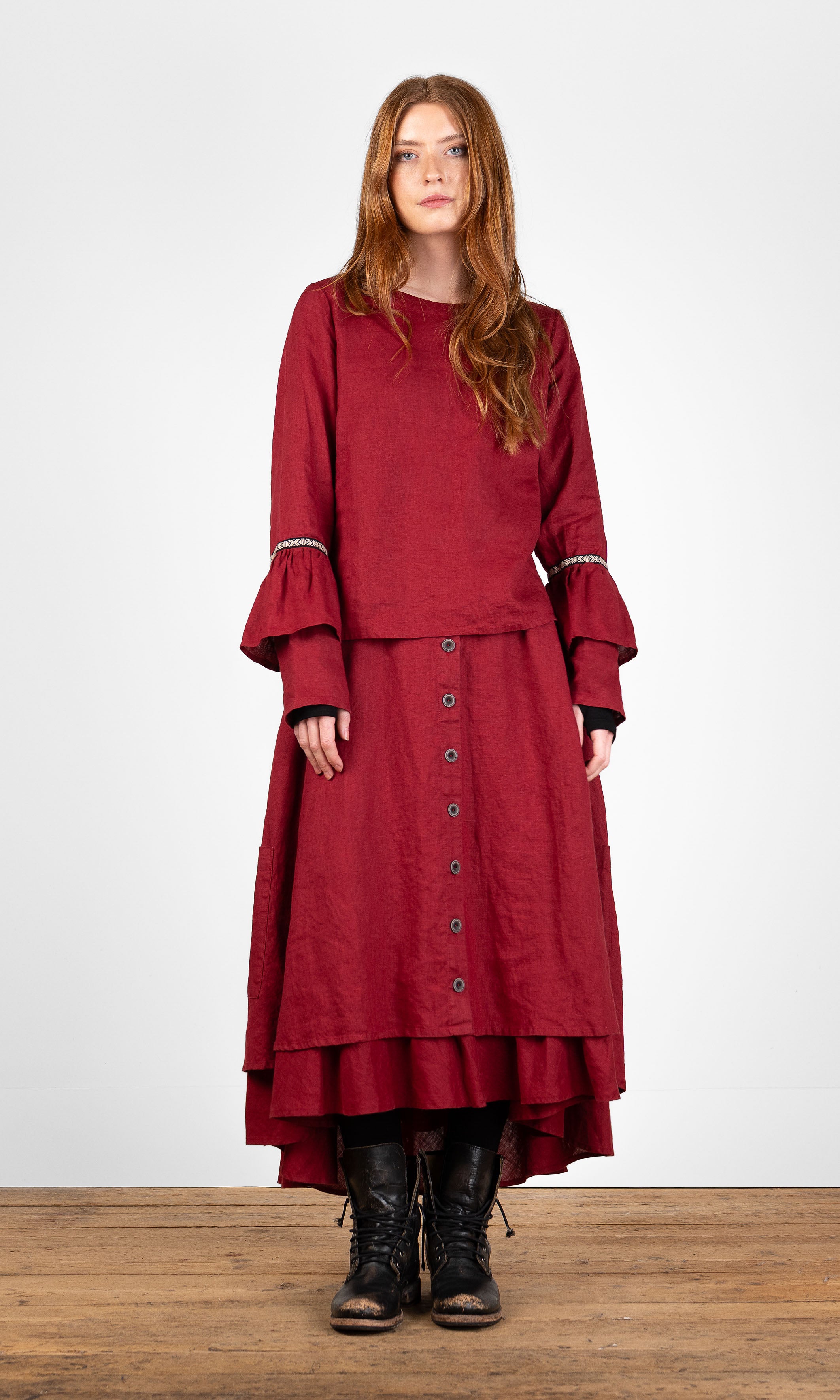 Linen blouse with ruffled sleeves and decorative ribbon