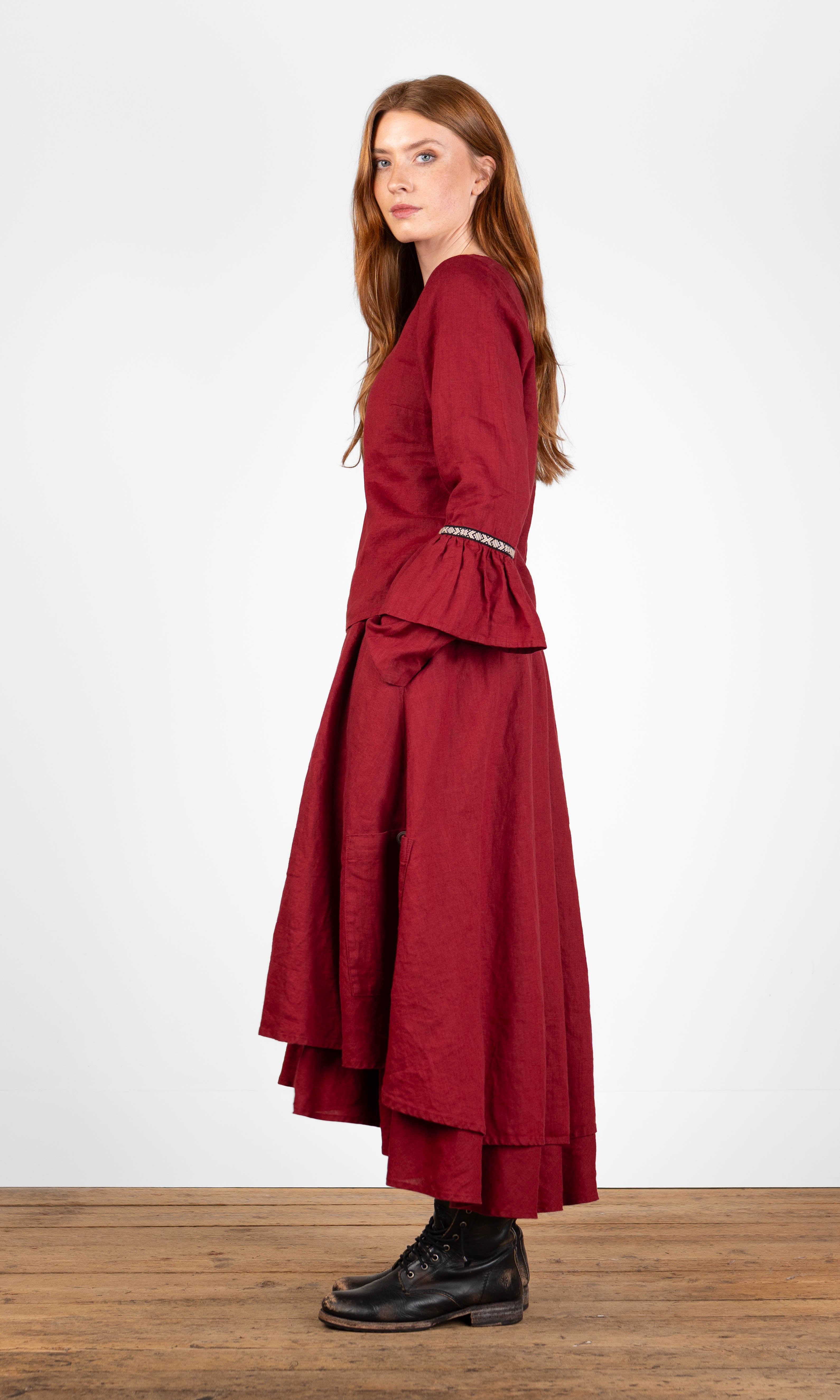 Linen blouse with ruffled sleeves and decorative ribbon