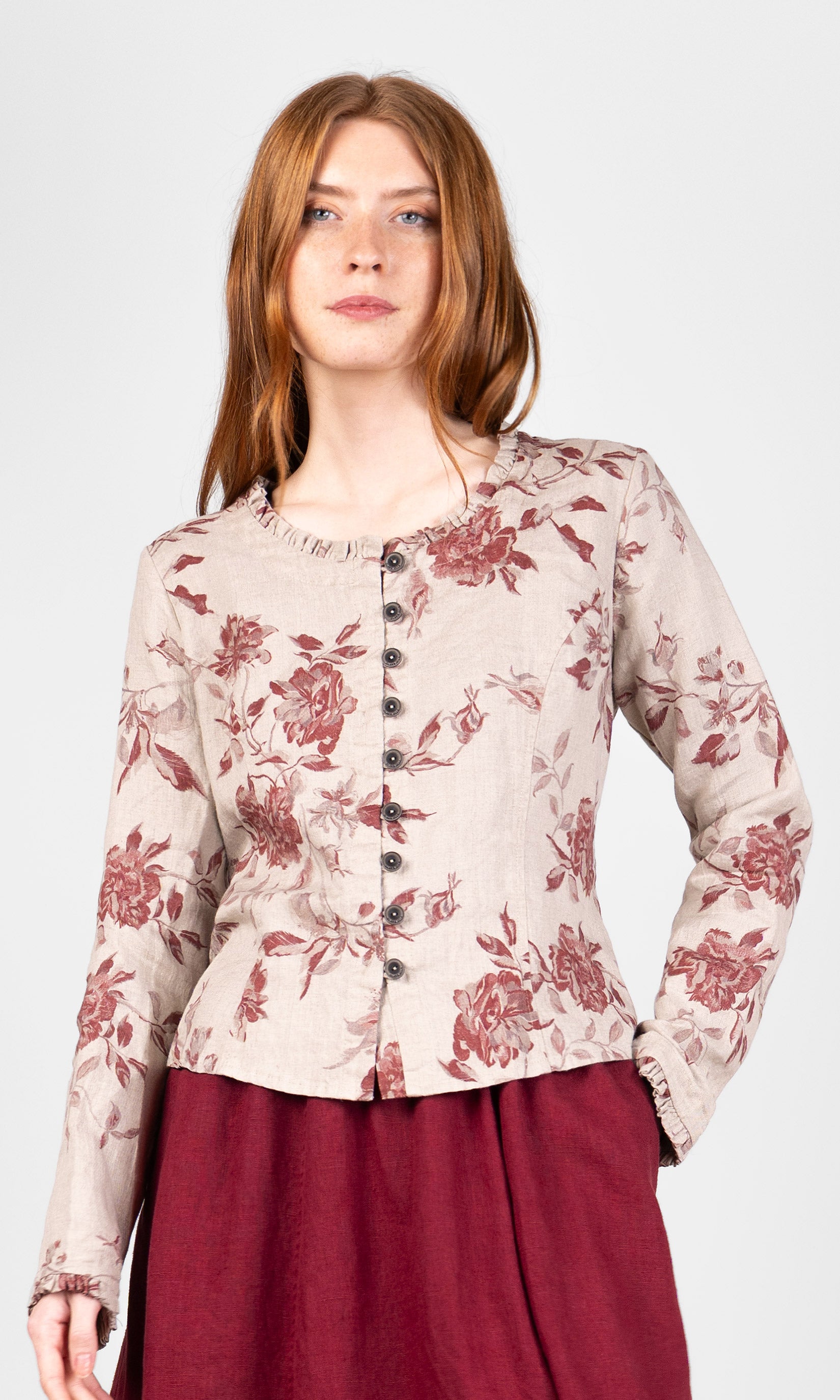 Fitted blouse with ruffle details