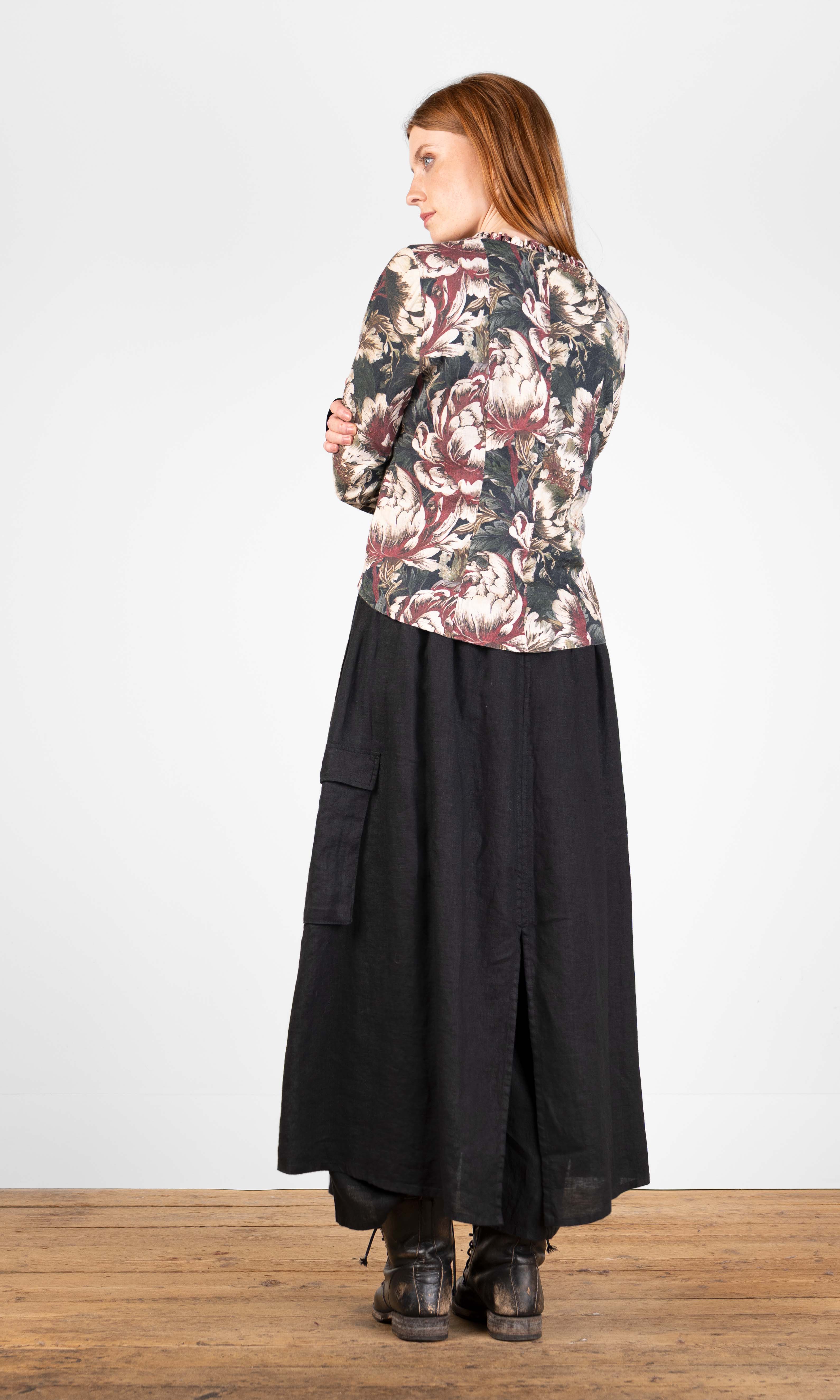 Fitted blouse with ruffle details