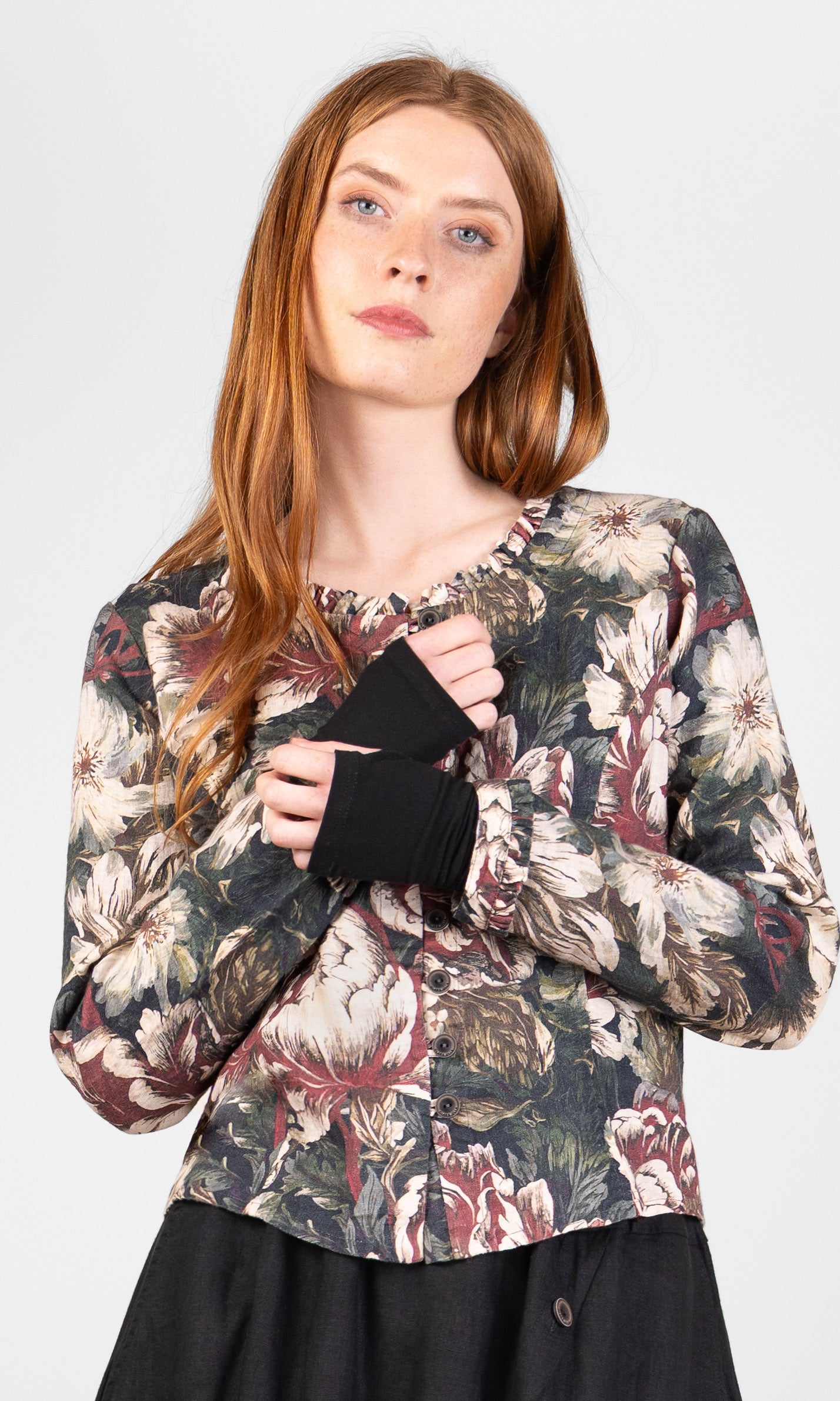 Fitted blouse with ruffle details