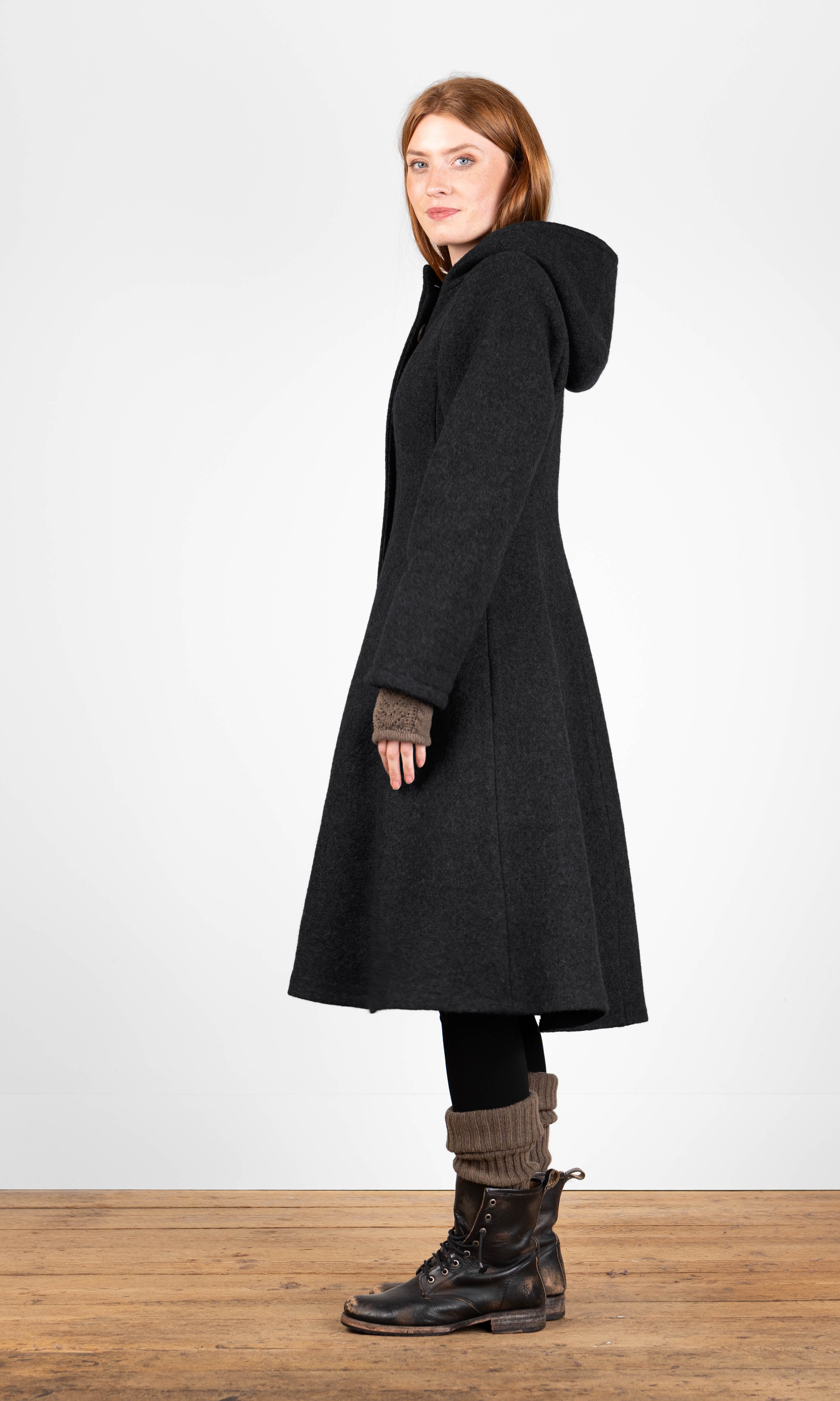 Wool coat with fastening and hood