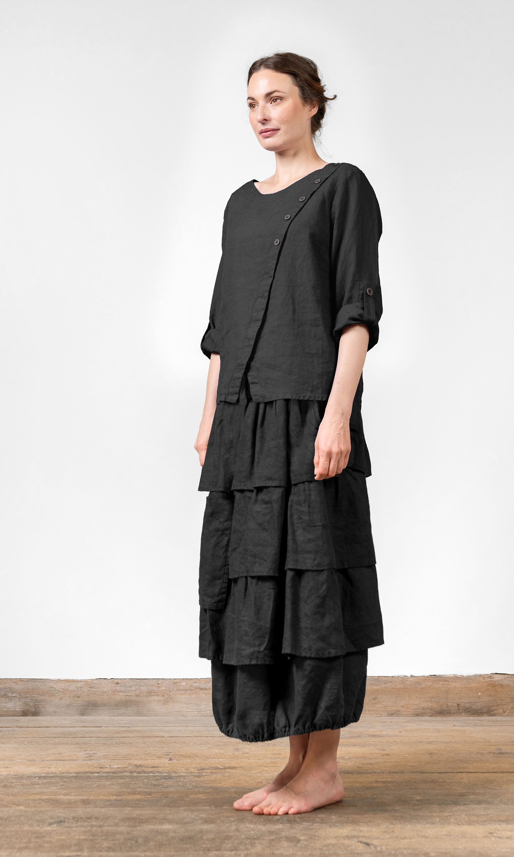 Blus med omlottknäppning